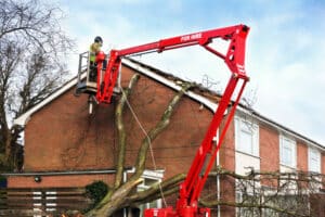 Roofing Contractors. Professional Viewing Damaged House Roof.